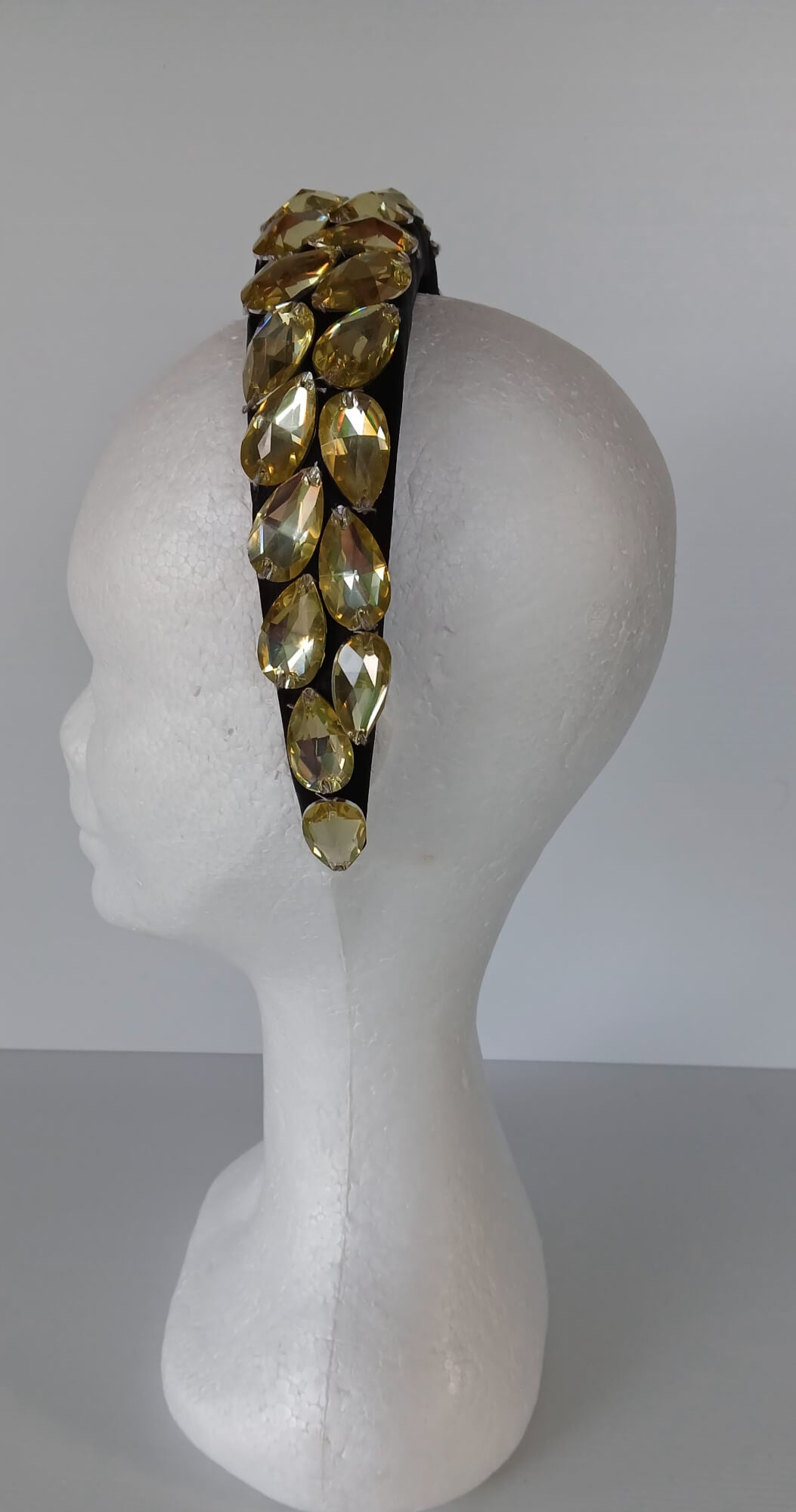 A picture of a Black and Silver Padded Headband by Melissa Rath Millinery.