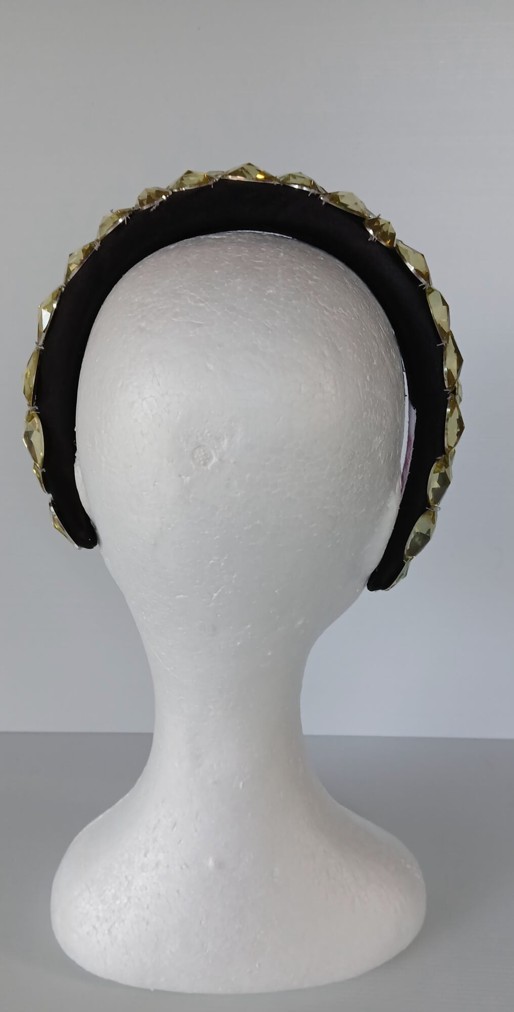 A picture of a Black and Silver Padded Headband by Melissa Rath Millinery.