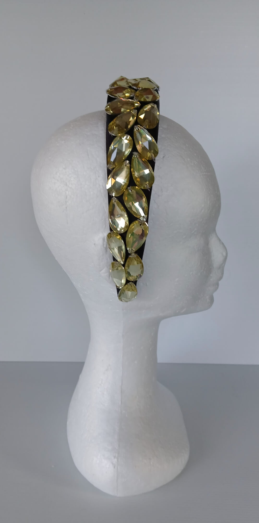 A picture of a Black and Silver Padded Headband by Melissa Rath Millinery.