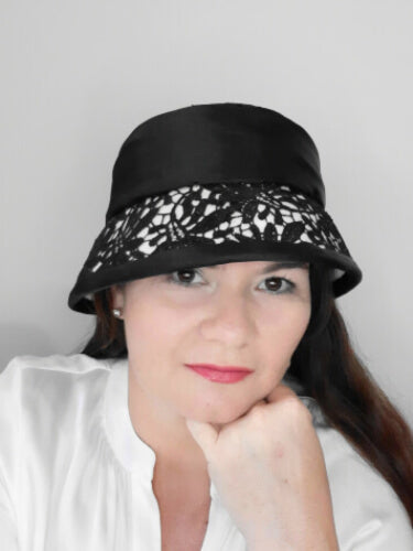A picture of a Black and White Coche by Melissa Rath Millinery.