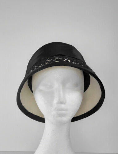 A picture of a Black and White Coche by Melissa Rath Millinery.