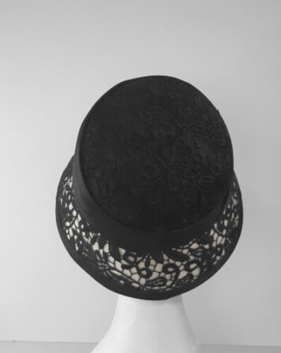 A picture of a Black and White Coche by Melissa Rath Millinery.