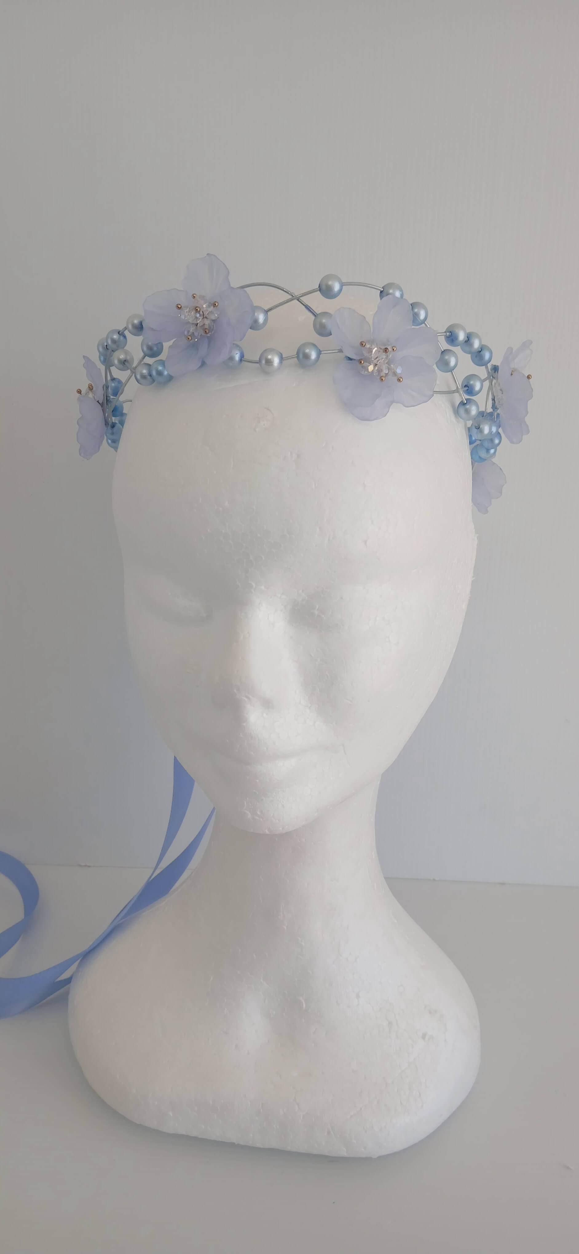 An image of the  Blue Beaded Halo Crown by Melissa Rath Millinery