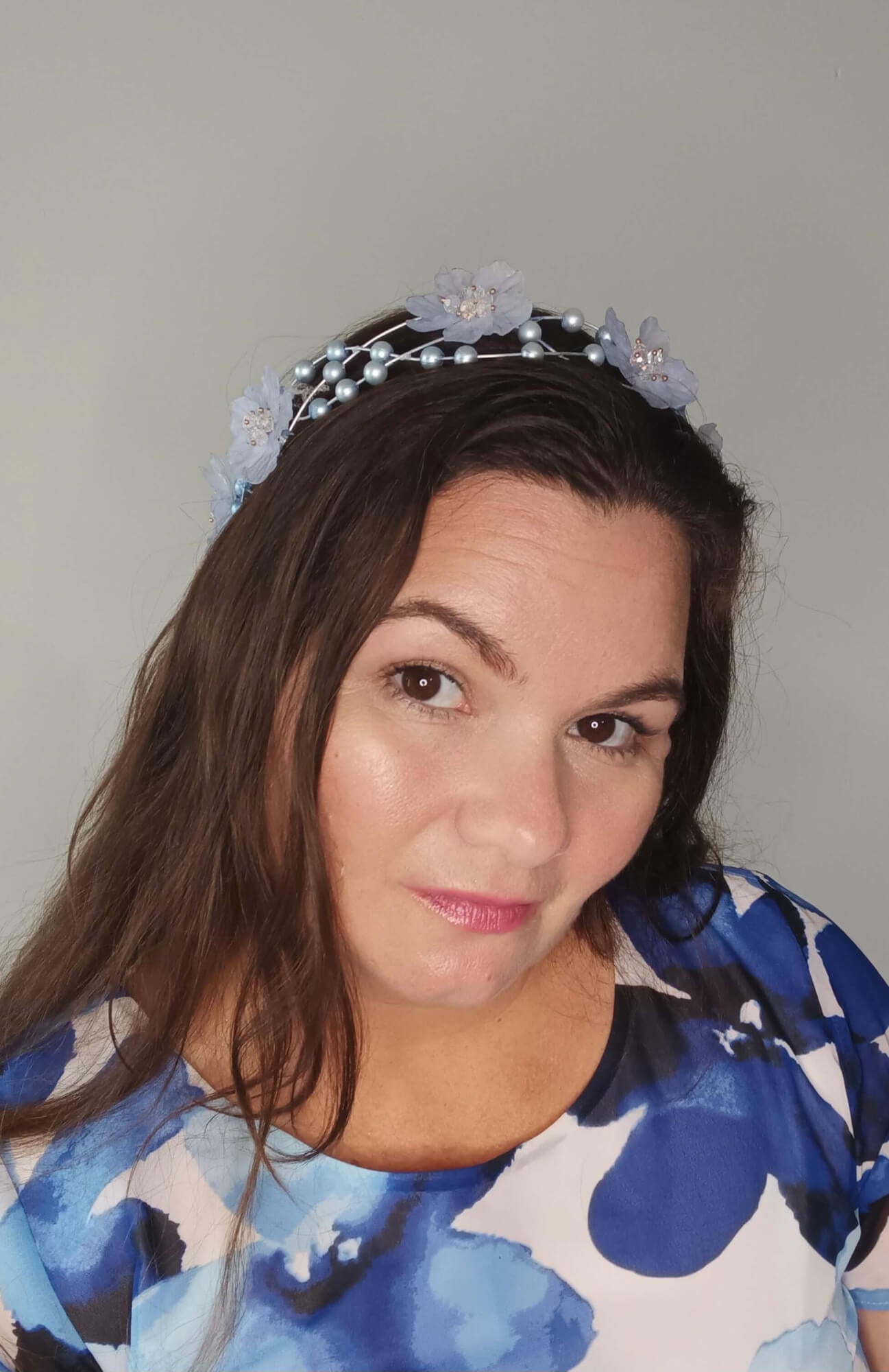 A picture of a pale blue halo headband by Melissa Rath Millinery