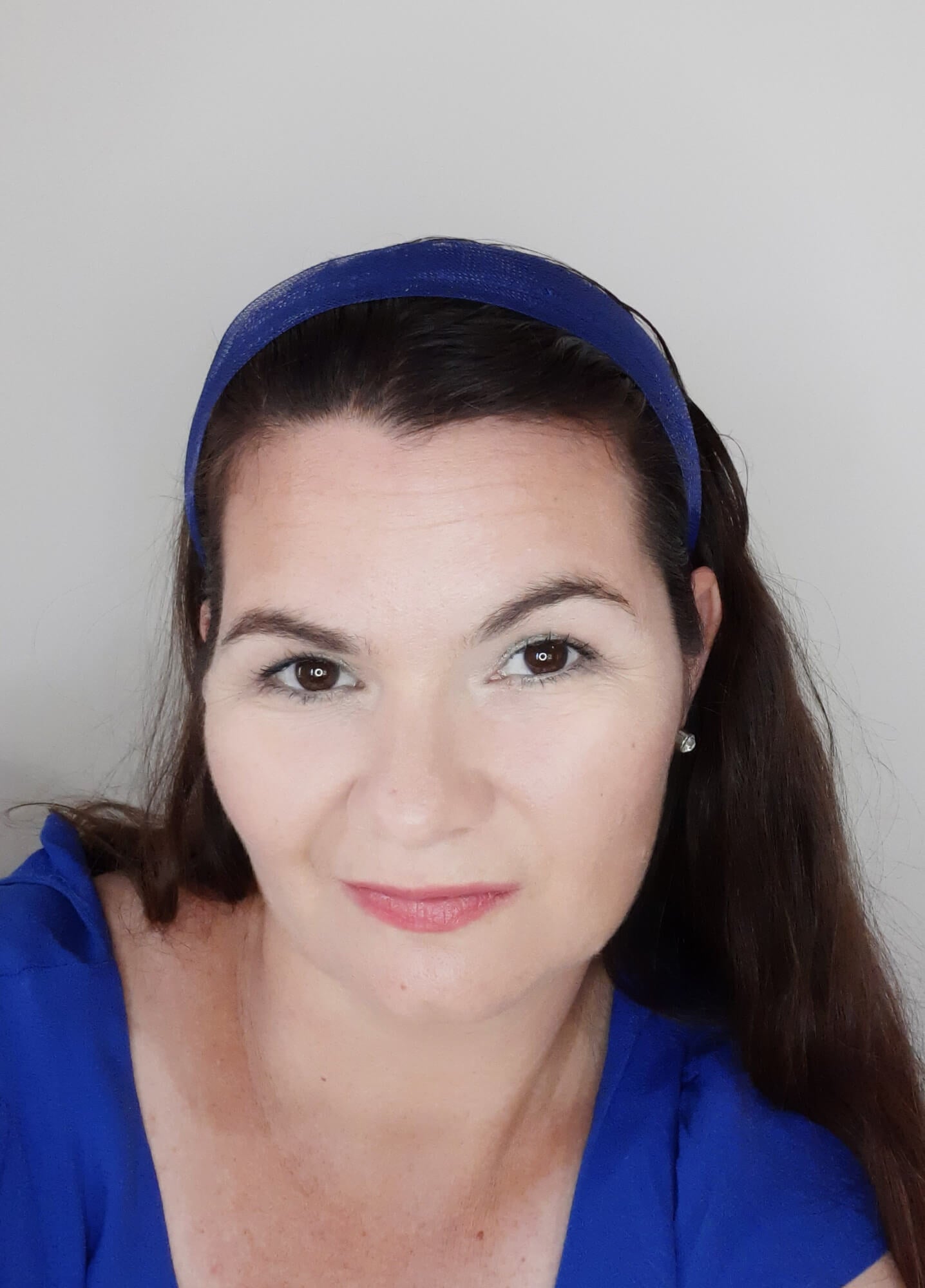 A picture of a blue crinoline headband by Melissa Rath Millinery.