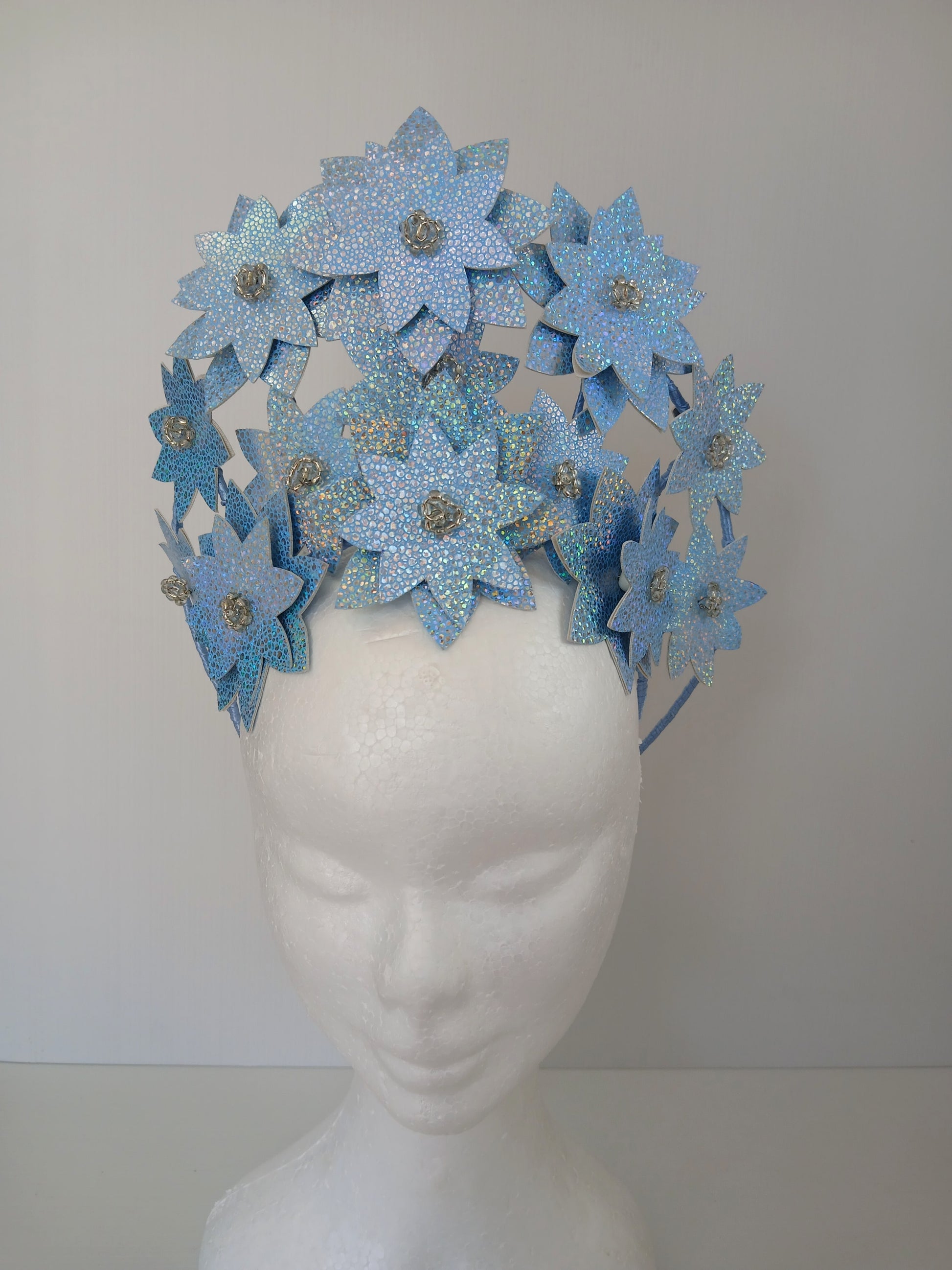 A picture is a Blue Pleather Millinery Crown by Melissa Rath Millinery