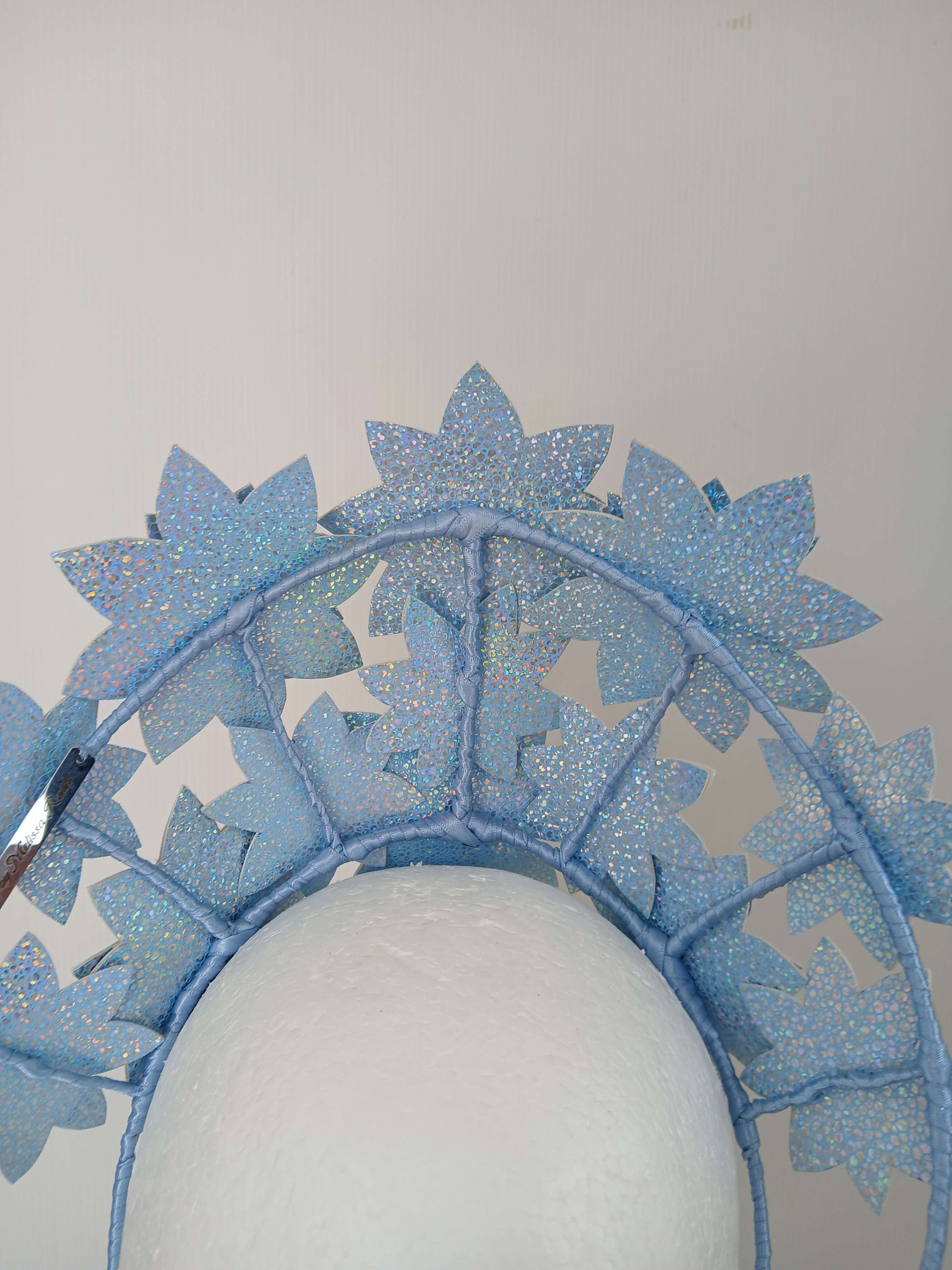 A picture is a Blue Pleather Millinery Crown by Melissa Rath Millinery