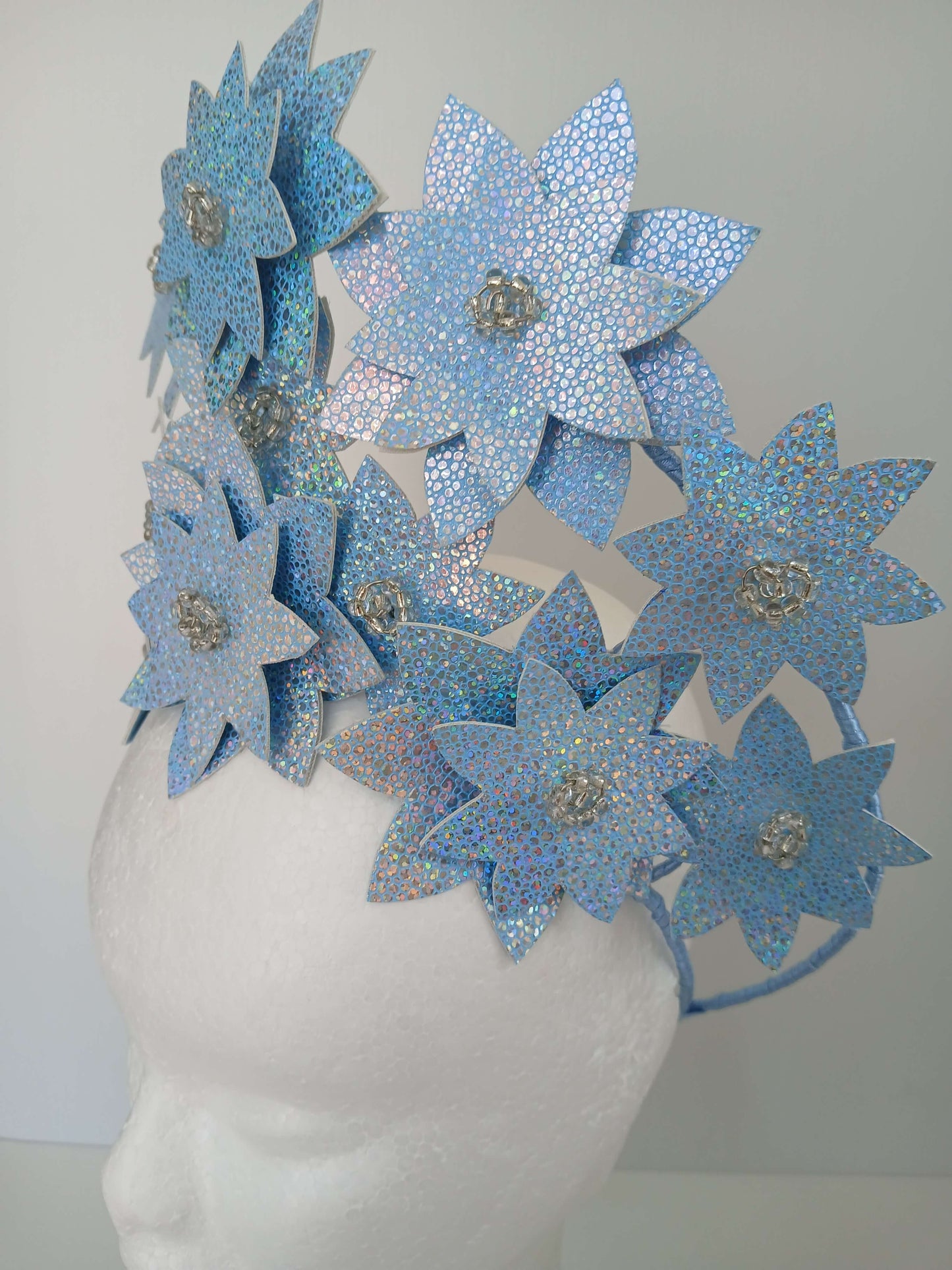 A picture is a Blue Pleather Millinery Crown by Melissa Rath Millinery