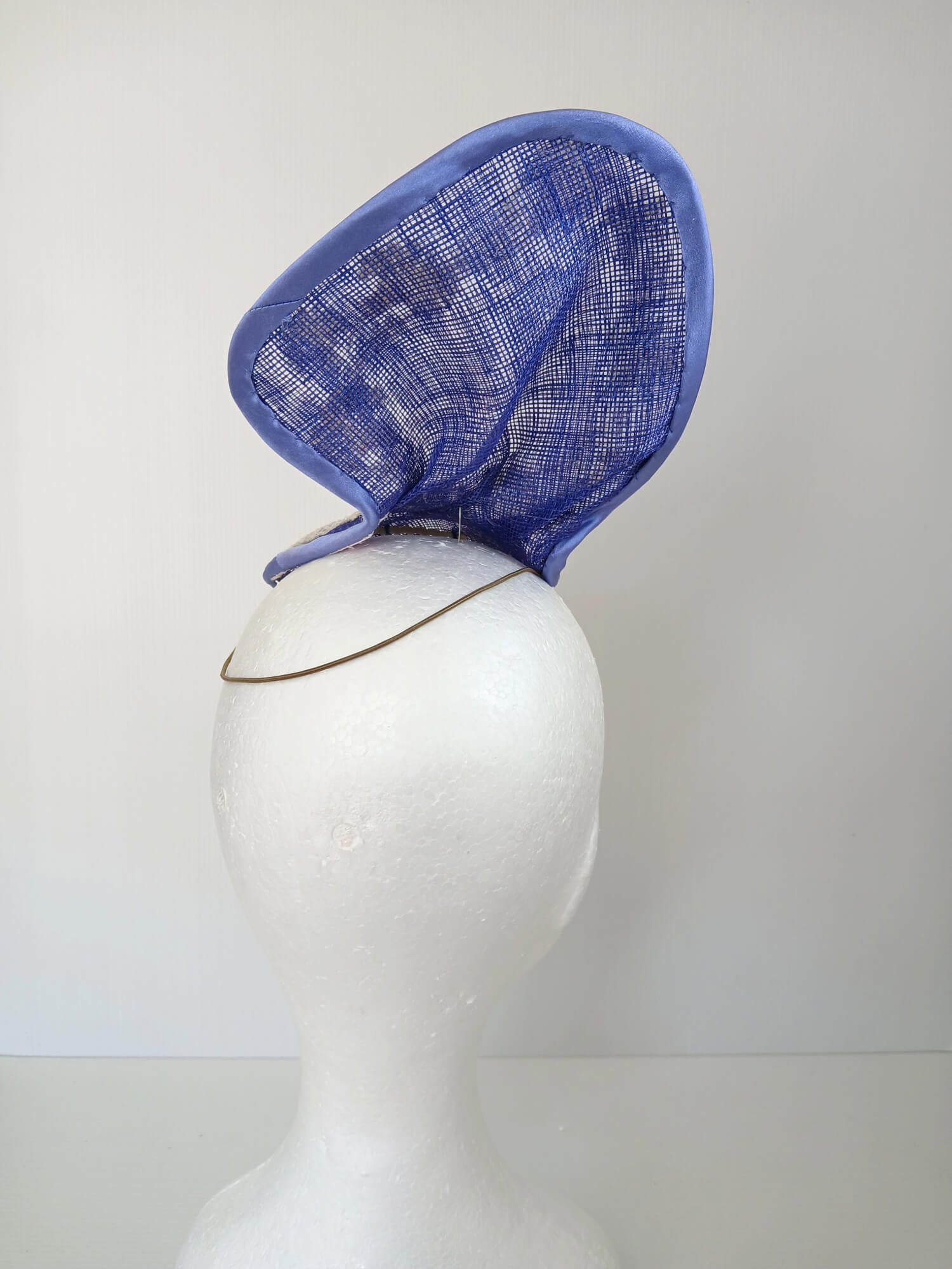 A picture of a Blue and White Sculptured Millinery Fascinator by Melissa Rath Millinery.