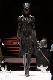 A picture of a model on the catwalk for the Burberry Autumn Winter 2022/2023 Catwalk show.