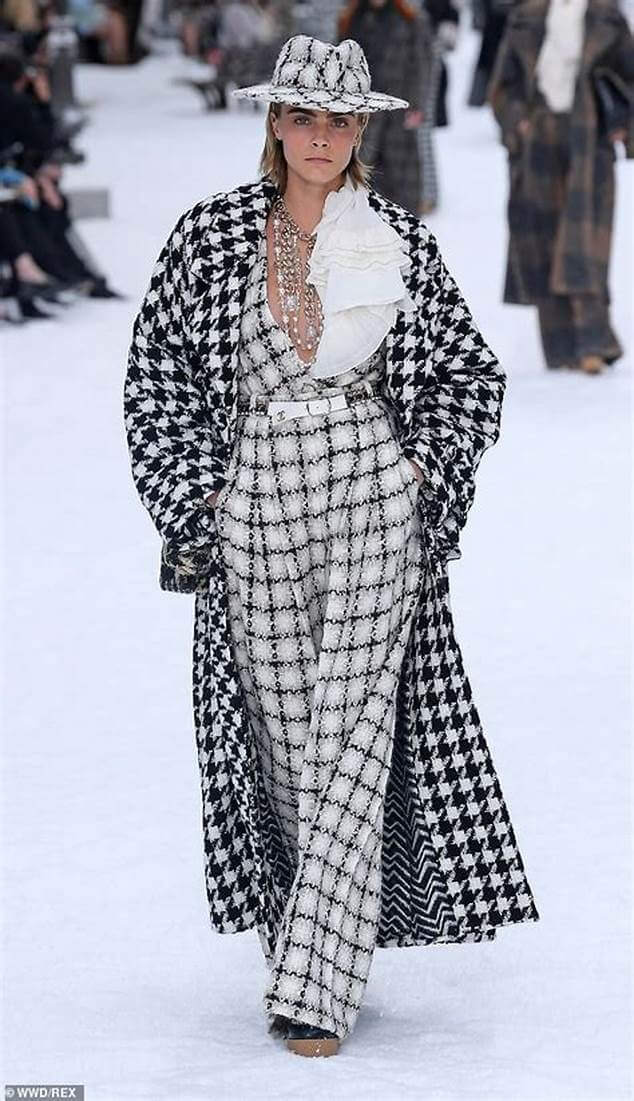A picture of a model on the catwalk for Chanel AW 2019.