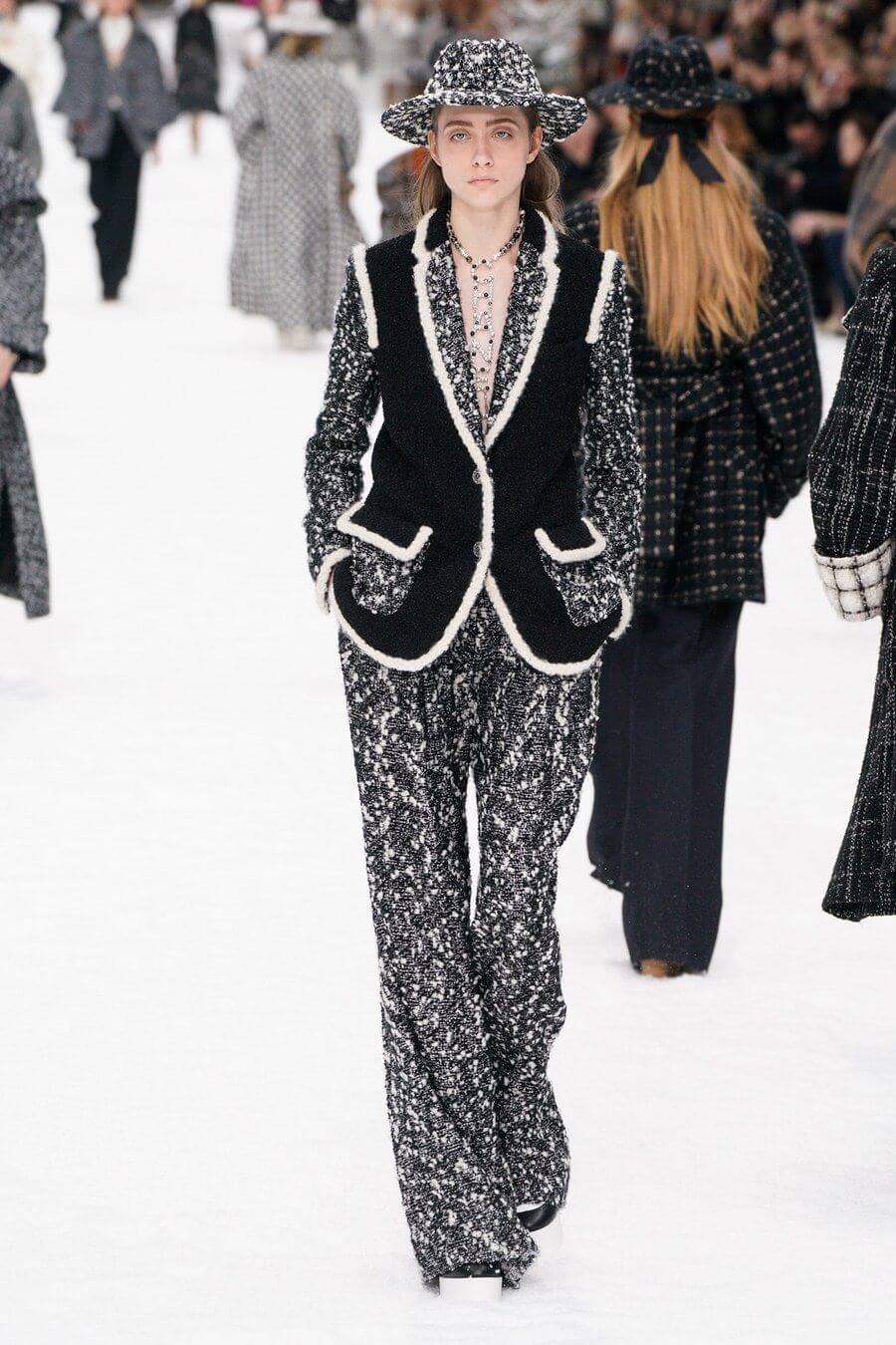 A picture of a model on the catwalk for Chanel AW 2019.