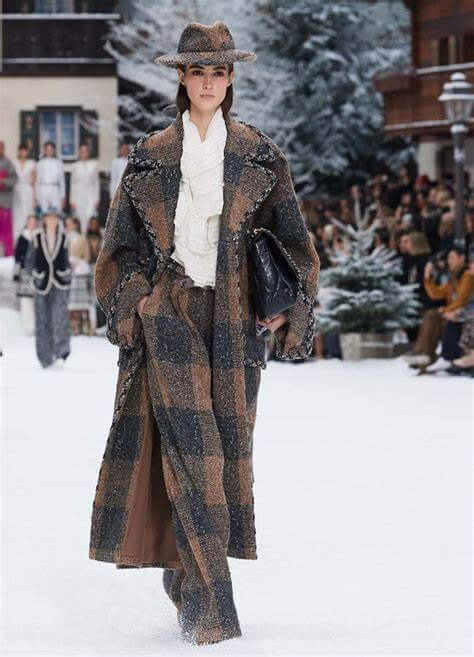A picture of a model on the catwalk for Chanel AW 2019.