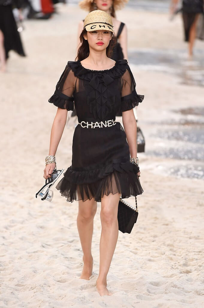 A picture of a model on the catwalk for Chanel SS 2019.