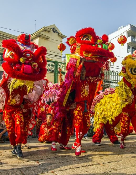 A picture of a Chinese New Year celebration, where red is a colour of celebration.