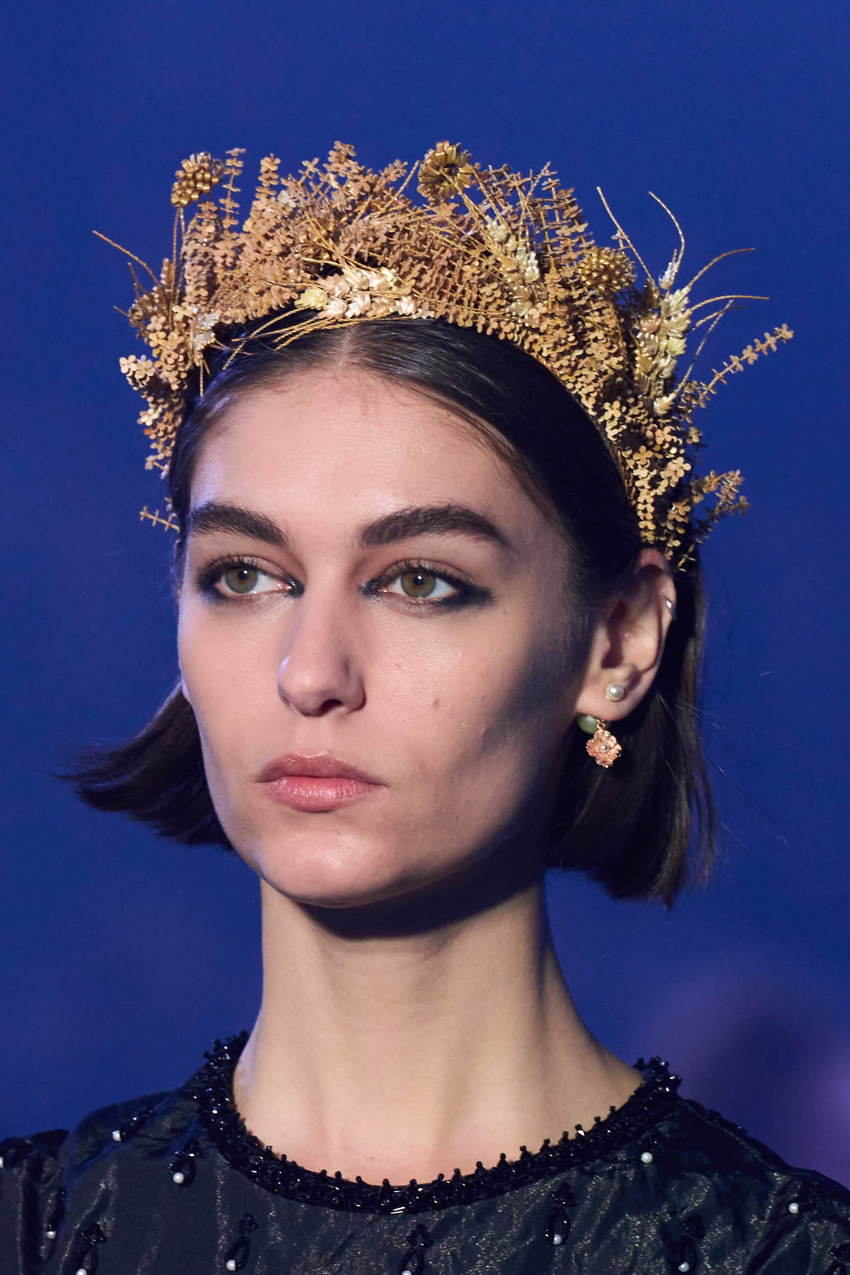 A picture of a model on the catwalk for Diors AW 2023 Collection.