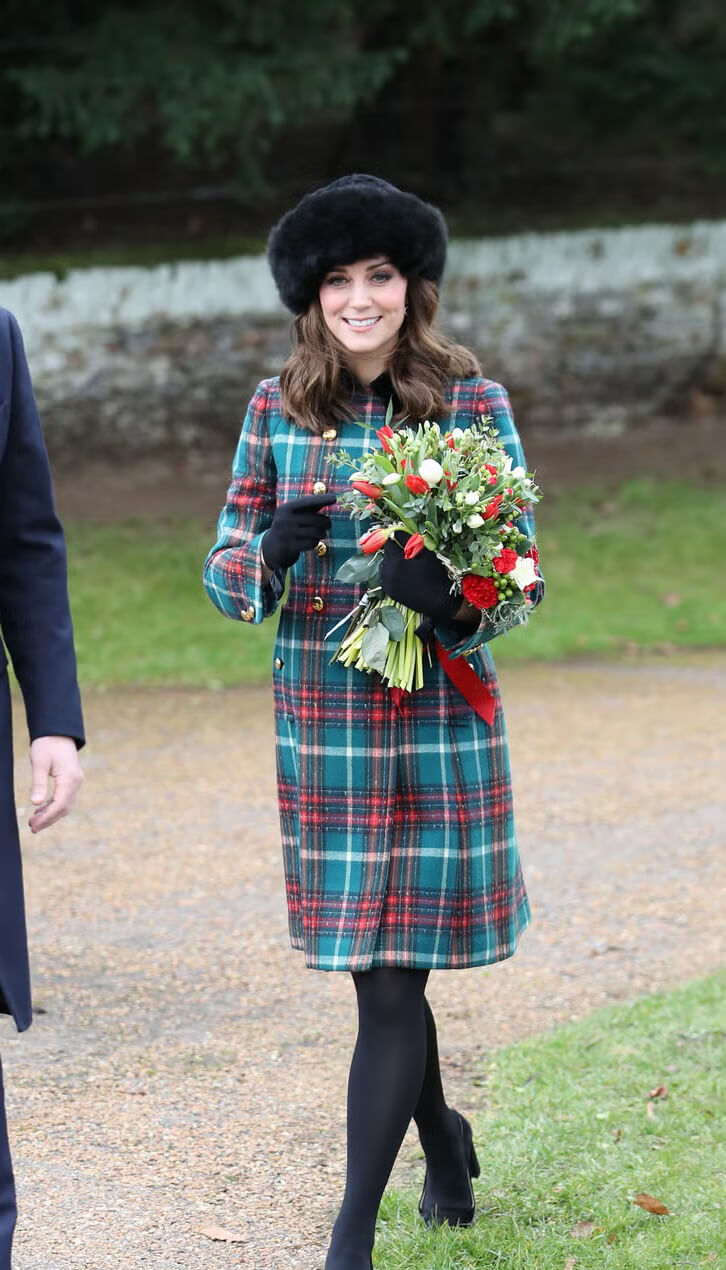 A picture of Duchess Catherine in a festive Christmas Day outfit.