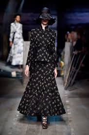 A picture of a model on the catwalk for  Erdem 2017.