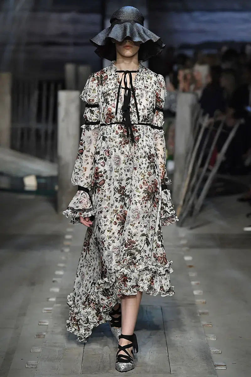 A picture of a model on the catwalk for  Erdem 2017.