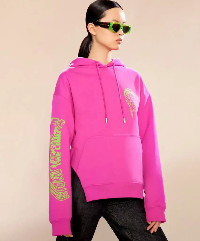 A picture of a model in a pink Fenty jumper by Rihanna