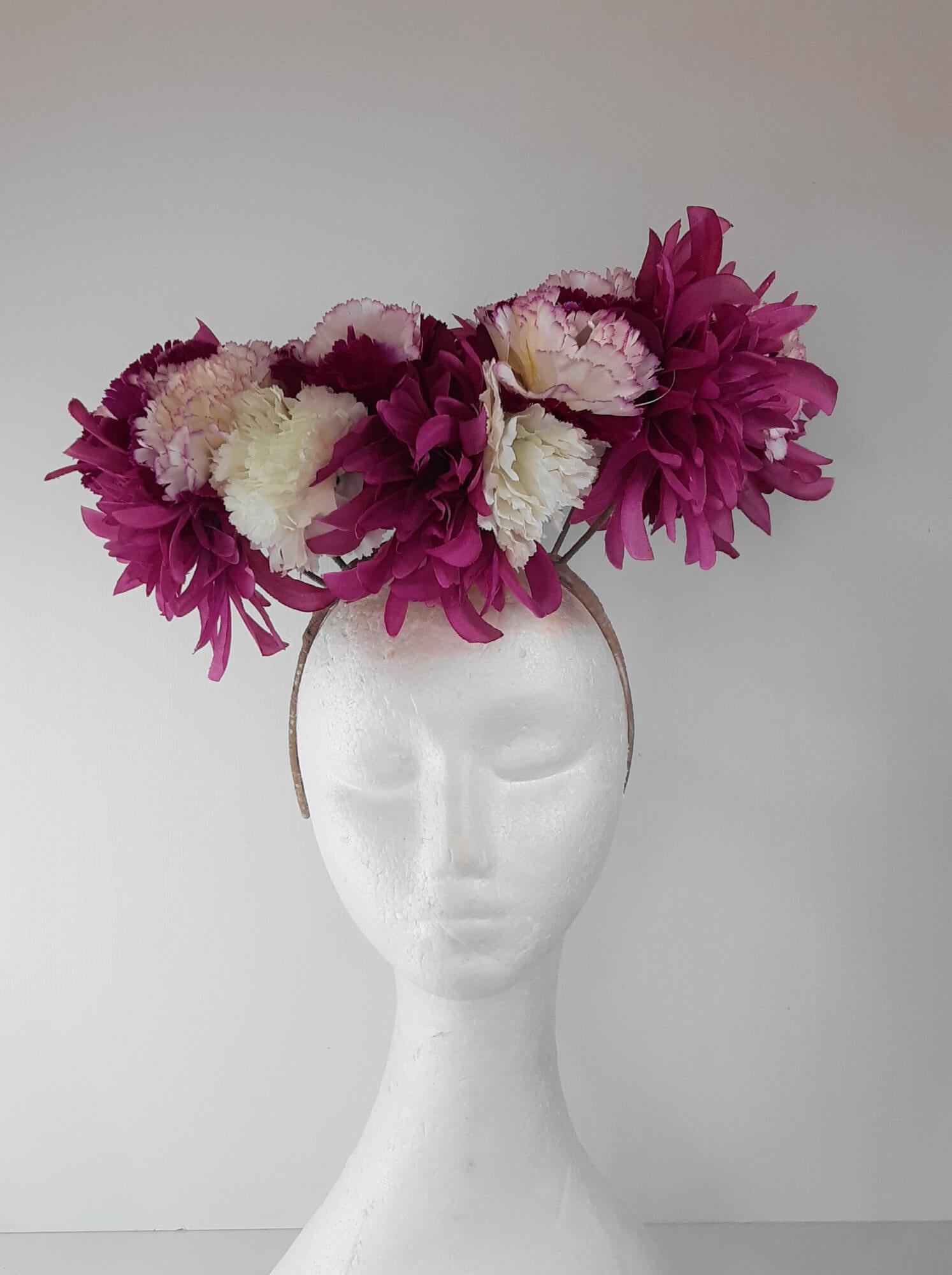 A picture of a floral floating millinery halo by Melissa Rath Millinery. 