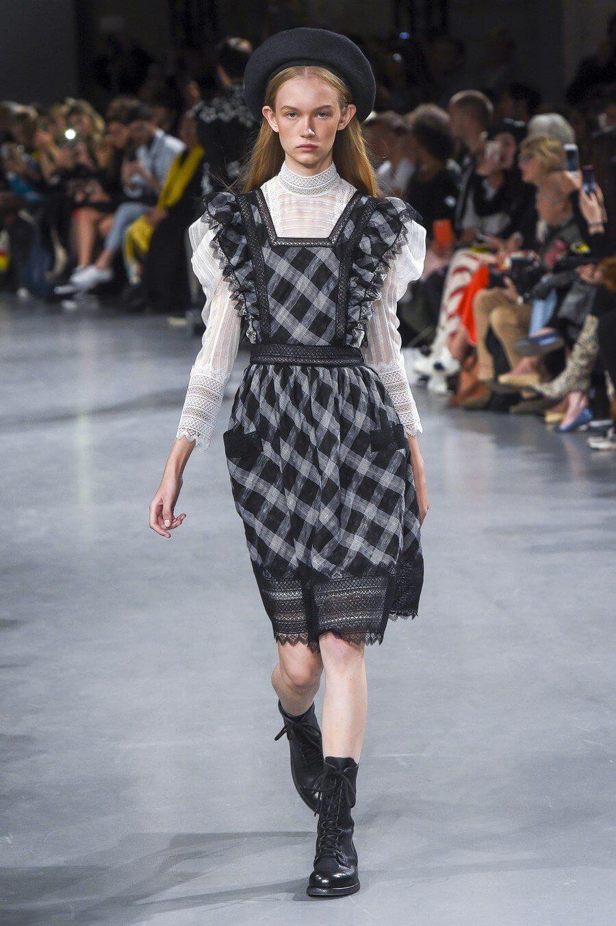 A picture of a model on the catwalk for Galliano SS 2019.