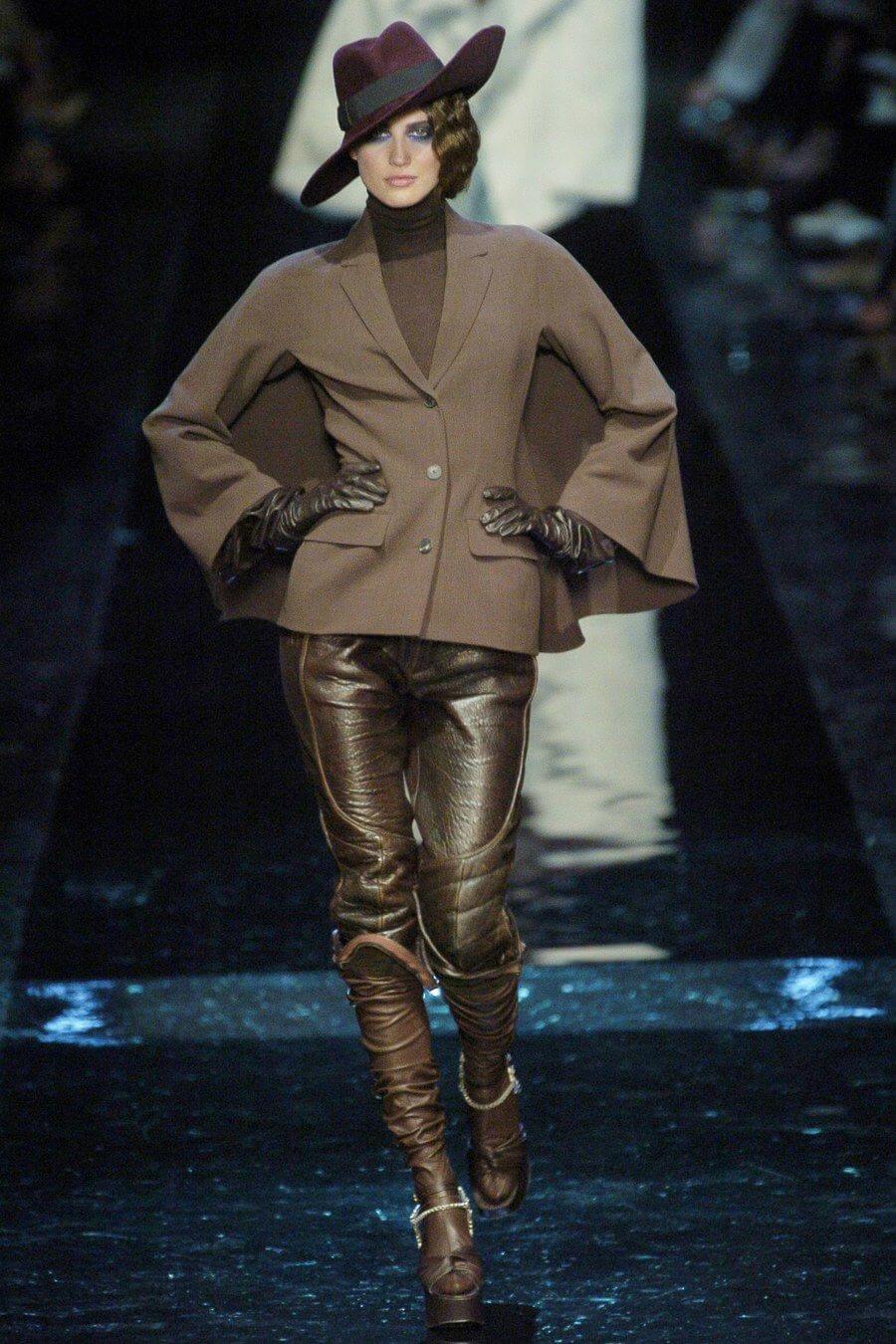 A picture of a model on the catwalk for Gaultier 2004.