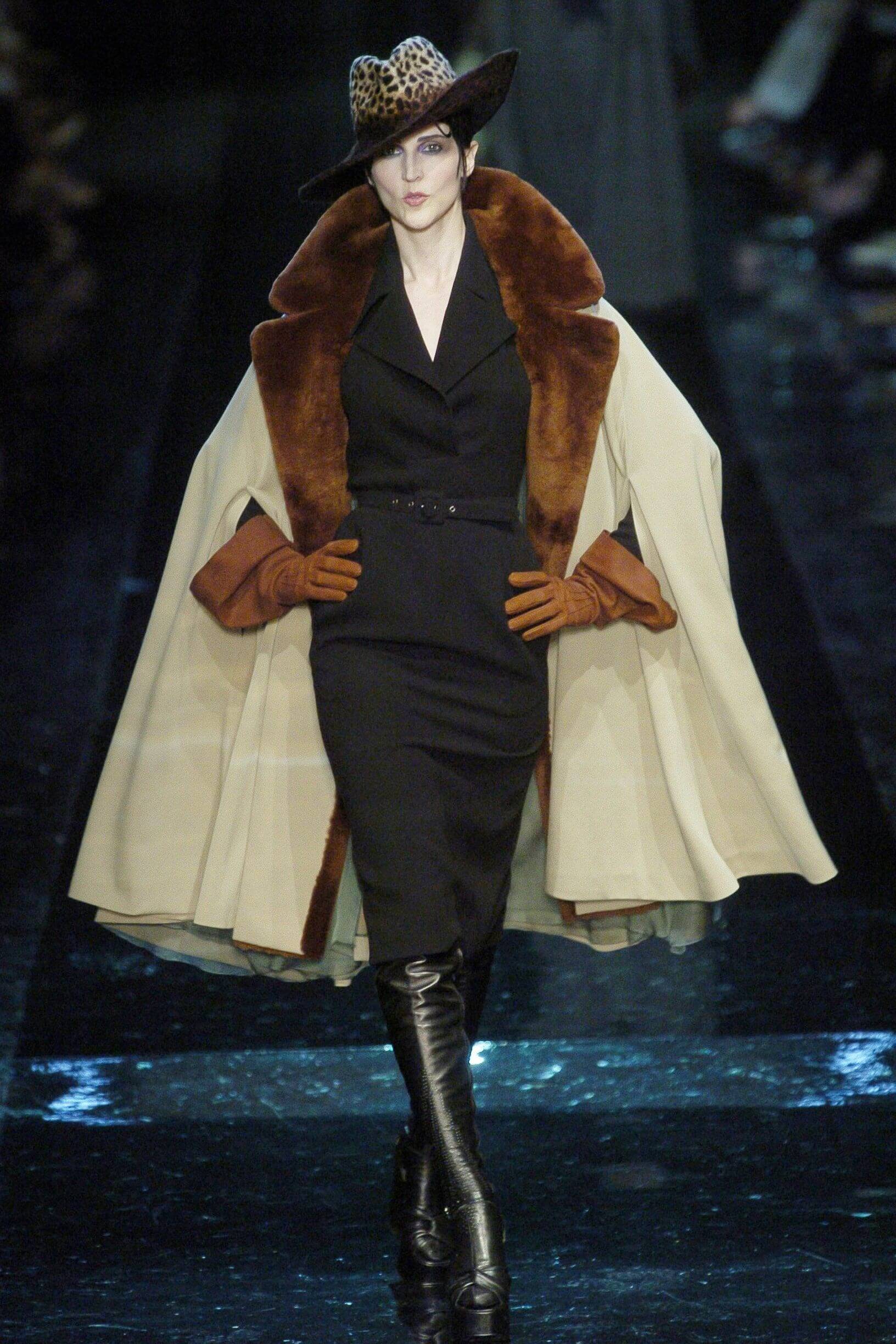 A picture of a model on the catwalk for Gaultier 2004.