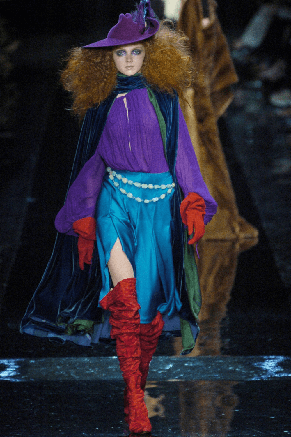 A picture of a model on the catwalk for Gaultier 2004.