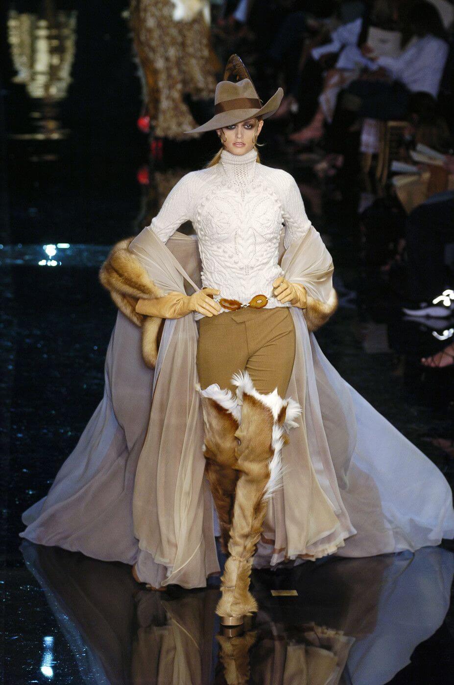 A picture of a model on the catwalk for Gaultier 2004.