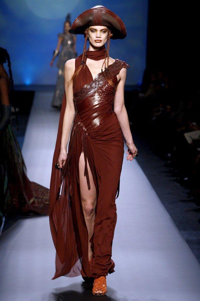 A picture of a model on the catwalk for Gaultier 2010.