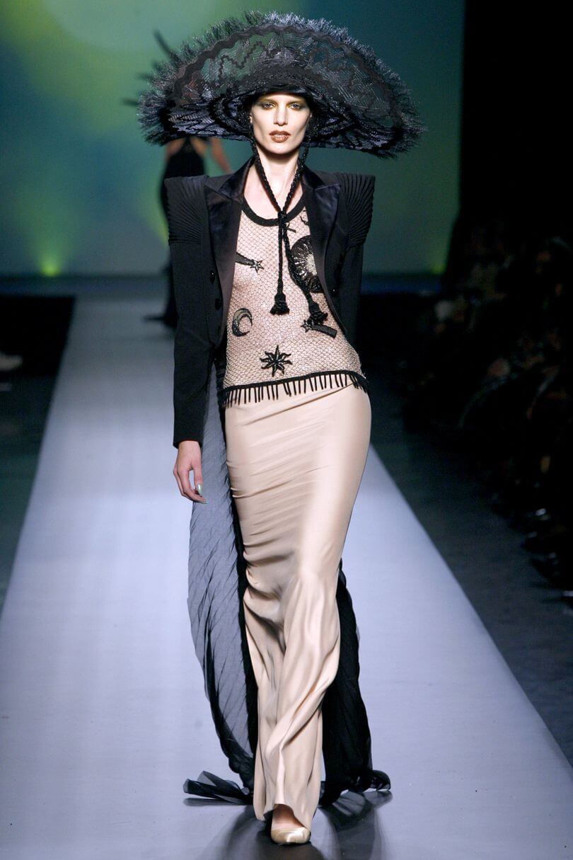 A picture of a model on the catwalk for Gaultier 2010.