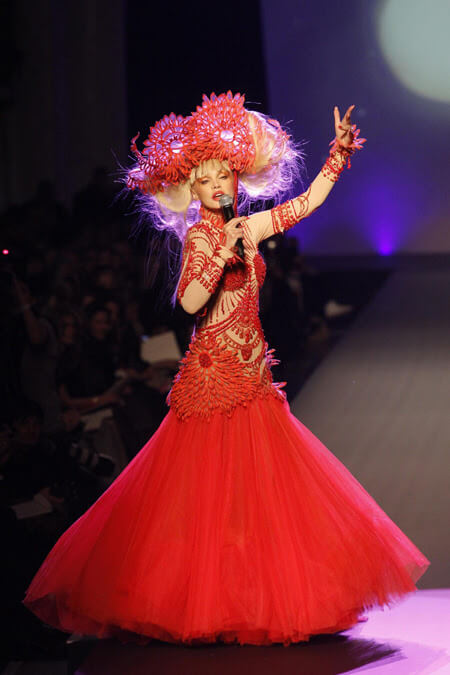 A picture of a model on the catwalk for Gaultier 2010.