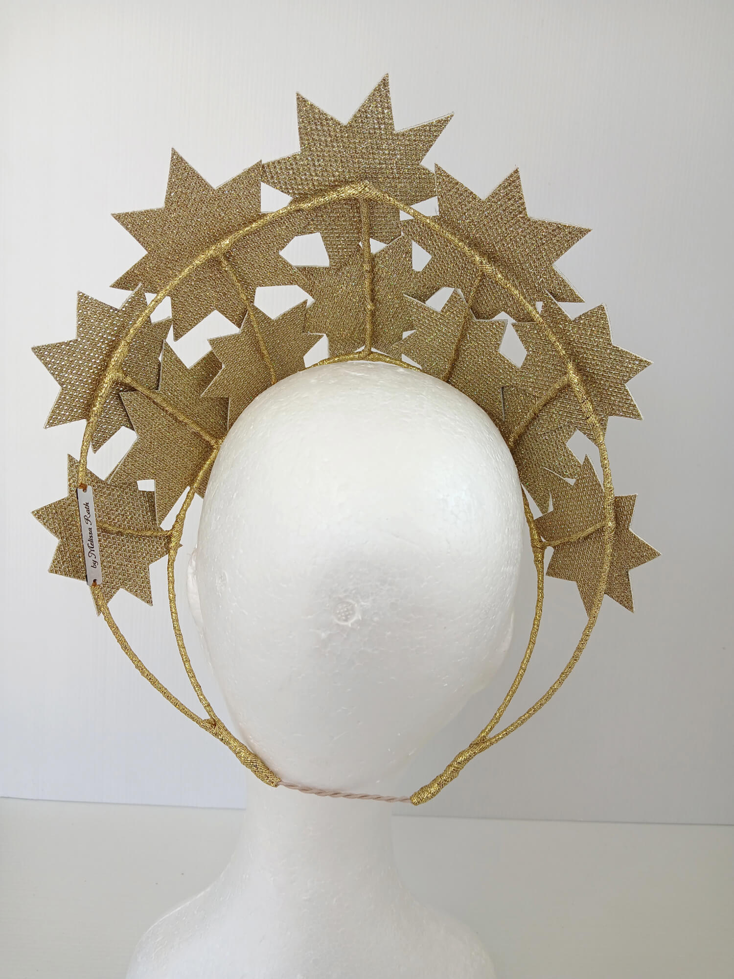 A picture of a Gold Pleather Millinery Crown by Melissa Rath Millinery.