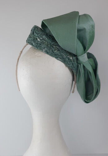 A picture of a Green Braided Millinery Beret by Melissa Rath Millinery.