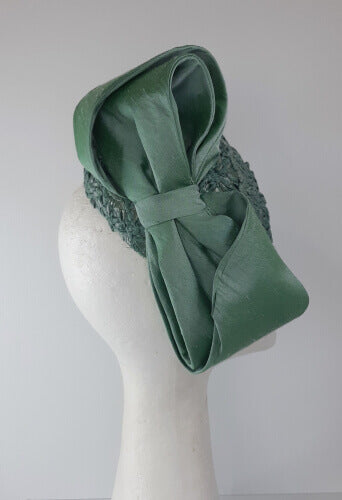 A picture of a Green Braided Millinery Beret by Melissa Rath Millinery.