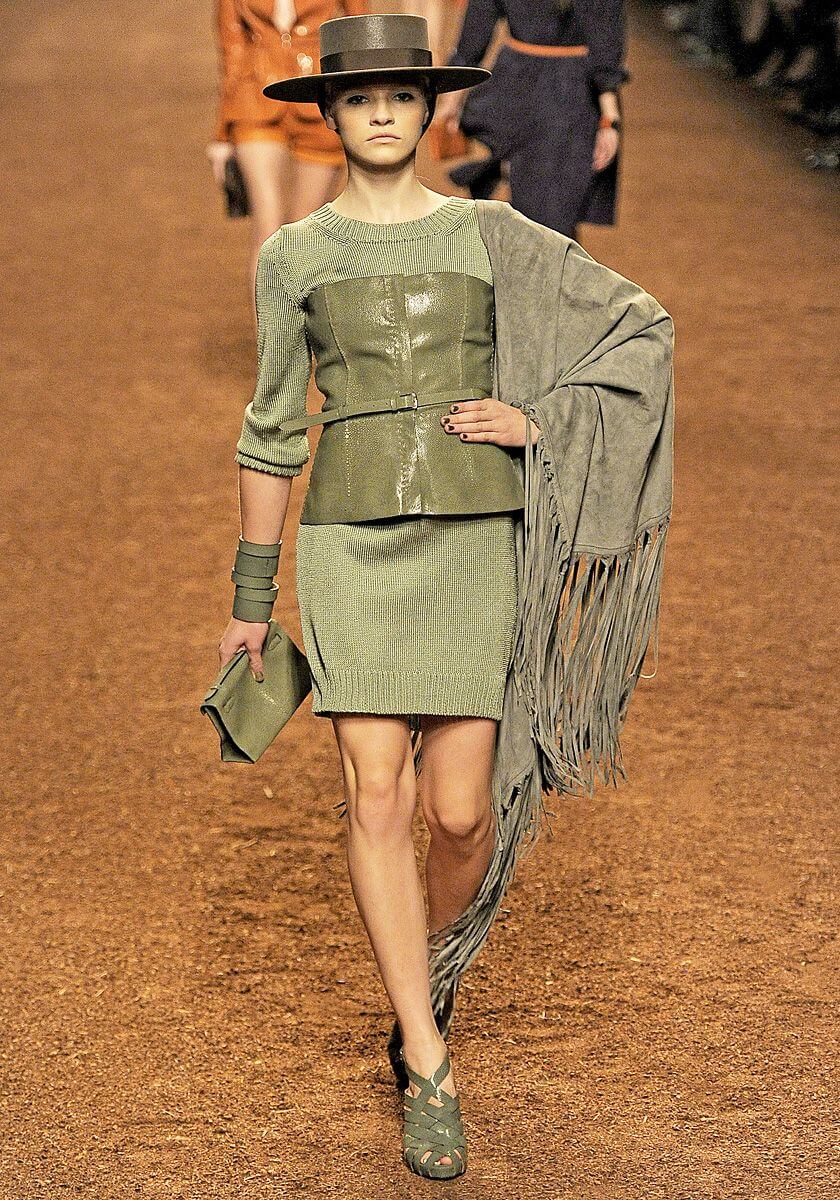 A picture of a model on the catwalk for Hermes 2011.