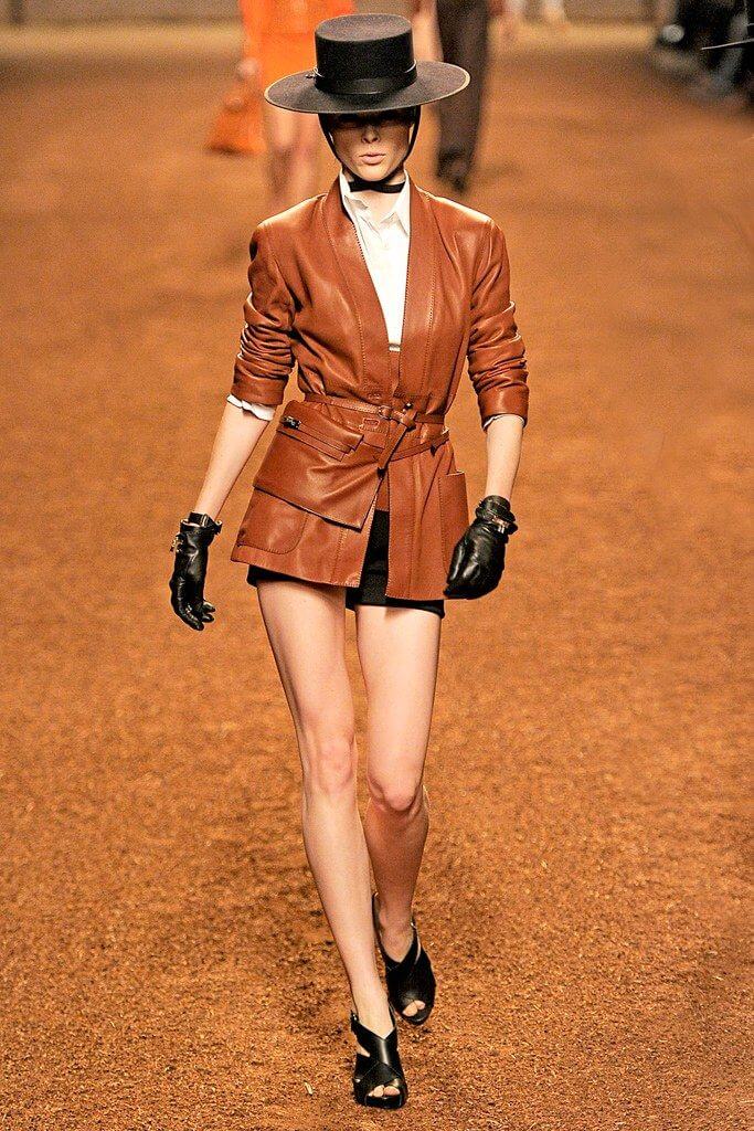 A picture of a model on the catwalk for Hermes 2011.