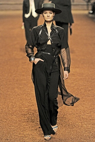 A picture of a model on the catwalk for Hermes 2011.