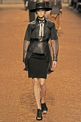 A picture of a model on the catwalk for Hermes 2011.