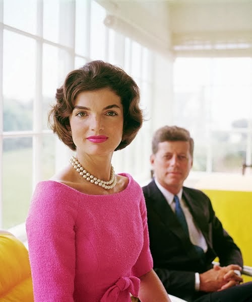 A picture of Jackie Kennedy in a pink dress, making pink look elegant.