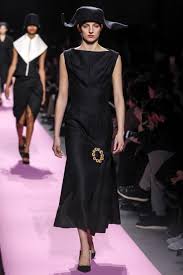 A picture of a model on the catwalk for  Jacquemus AW 2017.
