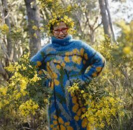 A picture of Jenny Kee, an Australian designer in the 1980's who used bright colours in her knitwear