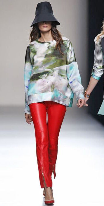 A picture of a model on the catwalk for  Juanjo Olivia SS 2014.