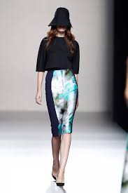 A picture of a model on the catwalk for  Juanjo Olivia SS 2014.