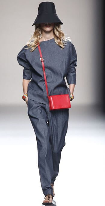 A picture of a model on the catwalk for  Juanjo Olivia SS 2014.
