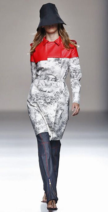 A picture of a model on the catwalk for  Juanjo Olivia SS 2014.