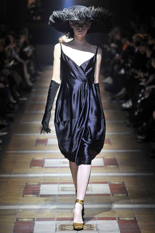 A picture of a model on the catwalk for  Lanvin AW 2014.