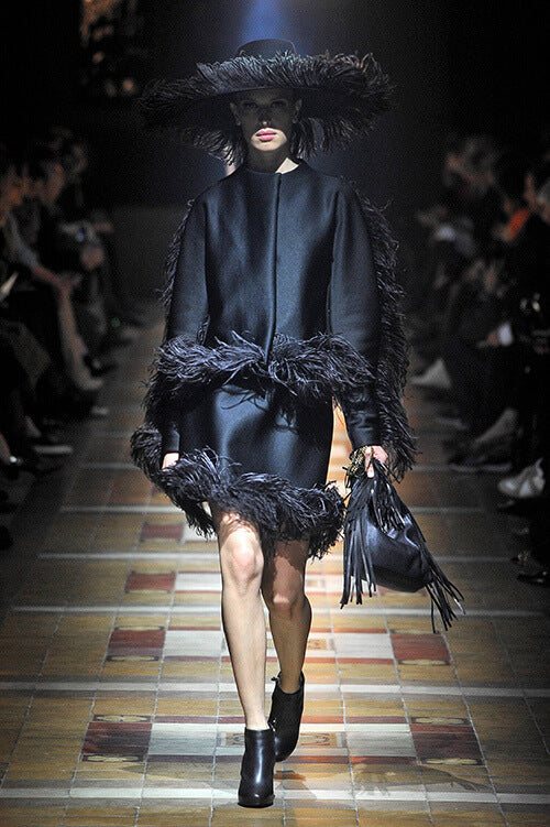 A picture of a model on the catwalk for  Lanvin AW 2014.