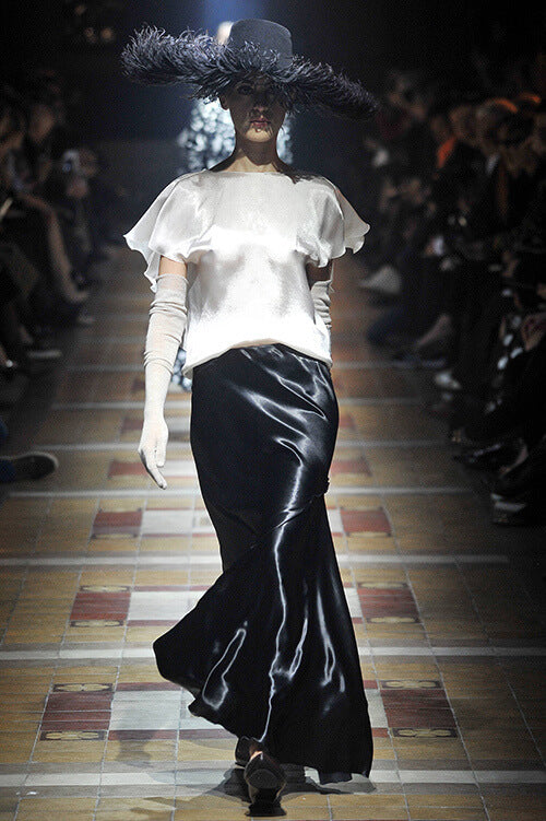 A picture of a model on the catwalk for  Lanvin AW 2014.